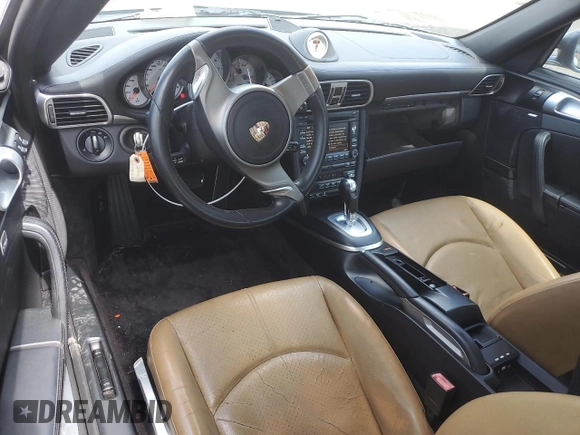2009 Porsche 911 Carrera S z VIN WP0AB29929S720512, wystawiony jako Copart lot #56697685 z przebiegiem 36 676 mil mil oraz Szkoda całkowita • Salvage title. Historia ofert i sprzedaży dostępna na DreamBid. Obrazek 8.