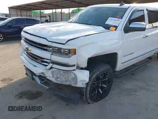 2016 Chevrolet Silverado 1500 LTZ with VIN 3GCUKSEJ0GG221628, listed as a IAAI auction lot 41276045 with 153,476 mi miles. Bid and sale history available at carsss.com. Image 6.