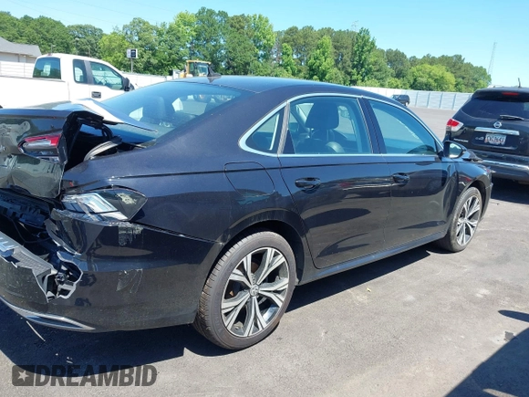 2021 Volkswagen Passat SE z VIN 1VWSA7A30MC003988, wystawiony jako IAAI lot #42238431 z przebiegiem 43 208 mil mil oraz . Historia ofert i sprzedaży dostępna na DreamBid. Obrazek 13.