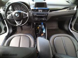 2016 BMW X1 xDrive28i with VIN WBXHT3C3XGP880243, listed as a Copart auction lot 54556895 with 57,200 mi miles and Clean Title. Bid and sale history available at carsss.com. Image 9.