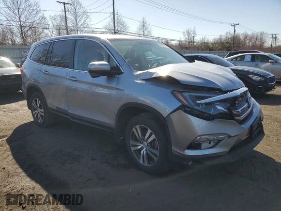 2017 Honda Pilot EX-L with VIN 5FNYF6H54HB103603, listed as a Copart auction lot 52052785 with 117,742 mi miles and Salvage Title. Bid and sale history available at DreamBid. Image 4.