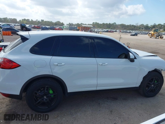 2014 Porsche Cayenne S z VIN WP1AB2A2XELA58986, wystawiony jako IAAI lot #41577501 z przebiegiem 53 672 mil mil oraz . Historia ofert i sprzedaży dostępna na DreamBid. Obrazek 13.