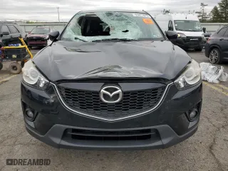 2015 Mazda CX-5 Touring with VIN JM3KE4CY3F0475757, listed as a Copart auction lot 53477875 with 104,546 mi miles and Salvage Title. Bid and sale history available at carsss.com. Image 5.