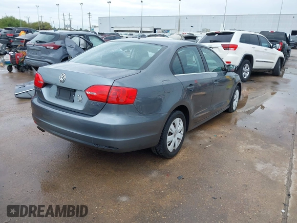 2013 Volkswagen Jetta SE with VIN 3VWDX7AJ9DM371414, listed as a IAAI auction lot 41861196 with 156,169 mi miles and . Bid and sale history available at DreamBid. Image 4.