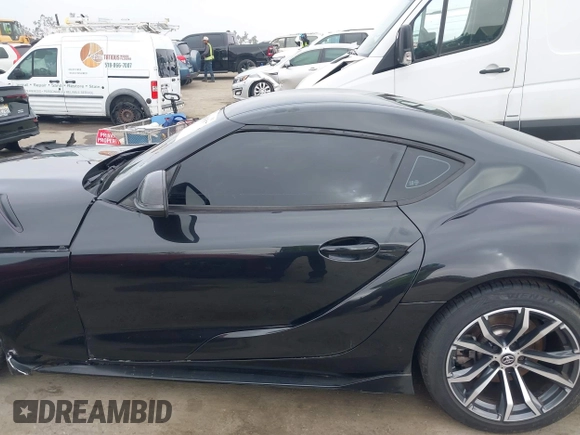 2021 Toyota Supra 2.0 with VIN WZ1DB2C07MW042723, listed as a IAAI auction lot 42635977 with 54,011 mi miles and . Bid and sale history available at DreamBid. Image 14.