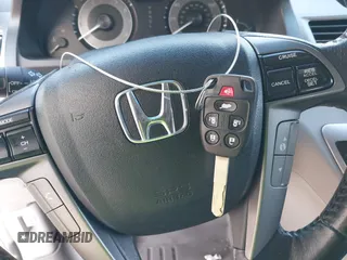 2011 Honda Odyssey Touring with VIN 5FNRL5H9XBB085626, listed as a IAAI auction lot 41890577 with 178,317 mi miles and . Bid and sale history available at DreamBid. Image 11.