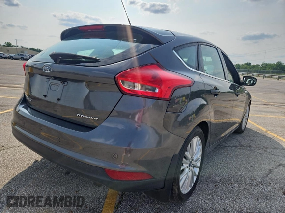 2017 Ford Focus Titanium with VIN 1FADP3N22HL279489, listed as a Copart auction lot 60740945 with 111,654 mi miles and Clean title. Bid and sale history available at DreamBid. Image 4.