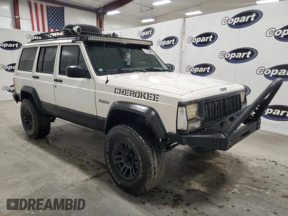 1996 Jeep Cherokee Sport with VIN 1J4FJ68S5TL235927, listed as a Copart auction lot 68942174 with 238,619 mi miles and Clean Title. Bid and sale history available at carsss.com. Image 4.