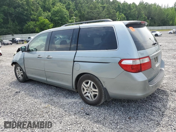 2005 Honda Odyssey EX-L with VIN 5FNRL38765B088756, listed as a Copart auction lot 57071365 with 243,277 mi miles and Salvage title. Bid and sale history available at DreamBid. Image 2.