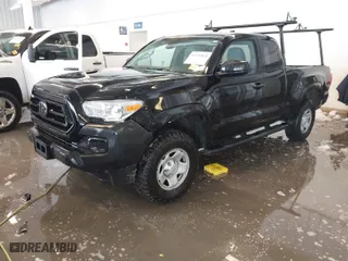 2023 Toyota Tacoma 2WD SR with VIN 3TYRX5GN2PT069110, listed as a IAAI auction lot 41235858 with 60,019 mi miles. Bid and sale history available at carsss.com. Image 2.
