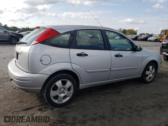 2007 Ford Focus S with VIN 1FAHP37N67W268162, listed as a Copart auction lot 71736384 with 69,391 mi miles and Salvage Title. Bid and sale history available at DreamBid. Image 3.