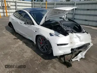 2023 Tesla Model 3 z VIN 5YJ3E1EA7PF576489, wystawiony jako Copart lot #61039505 z przebiegiem 35 243 mil mil oraz Nie do naprawy • Non repairable. Historia ofert i sprzedaży dostępna na DreamBid. Obrazek 14.