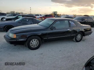 1988 Ford Thunderbird with VIN 1FABP60F9JH246775, listed as a Copart auction lot 77428264 with Not Provided miles and Salvage Title. Bid and sale history available at DreamBid. Image 1.