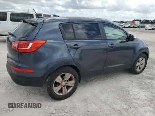 2012 Kia Sportage LX z VIN KNDPB3A29C7240993, wystawiony jako Copart lot #61408165 z przebiegiem 171 453 mil mil oraz Czysty tytuł • Clean title. Historia ofert i sprzedaży dostępna na DreamBid. Obrazek 3.