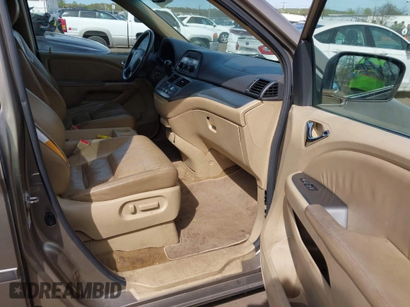 2010 Honda Odyssey EX-L with VIN 5FNRL3H68AB055744, listed as a IAAI auction lot 42107273 with 193,289 mi miles. Bid and sale history available at carsss.com. Image 5.