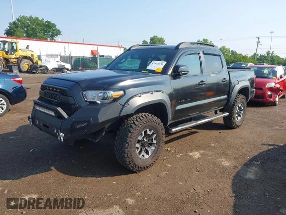 2017 Toyota Tacoma SR5 with VIN 3TMCZ5ANXHM099610, listed as a IAAI auction lot 42441050 with 85,046 mi miles and . Bid and sale history available at DreamBid. Image 2.