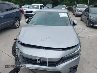 2023 Honda Civic EX with VIN 2HGFE1F77PH321210, listed as a IAAI auction lot 42379950 with Not provided miles and . Bid and sale history available at DreamBid. Image 12.