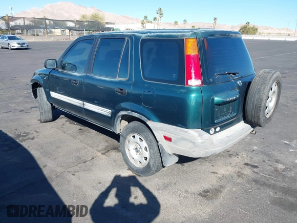 1999 Honda CR-V LX with VIN JHLRD1847XC031475, listed as a IAAI auction lot 41606369 with 254,445 mi miles. Bid and sale history available at carsss.com. Image 3.