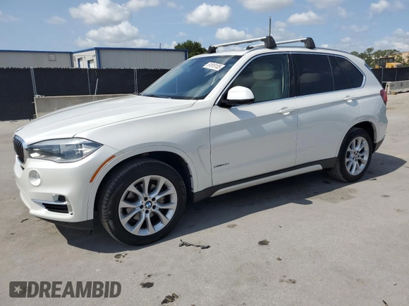 2014 BMW X5 xDrive35i z VIN 5UXKR0C51E0H17912, wystawiony jako Copart lot #61819105 z przebiegiem 218 784 mil mil oraz Czysty tytuł • Clean title. Historia ofert i sprzedaży dostępna na DreamBid. Obrazek 1.