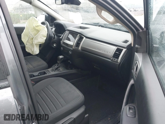 2023 Ford Ranger XL z VIN 1FTER4FH7PLE04499, wystawiony jako IAAI lot #42422898 z przebiegiem 21 618 mil mil oraz . Historia ofert i sprzedaży dostępna na DreamBid. Obrazek 5.