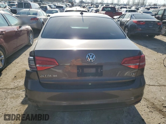 2015 Volkswagen Jetta SE with VIN 3VWD17AJ9FM283810, listed as a Copart auction lot 43255024 with 135,067 mi miles and Salvage title. Bid and sale history available at DreamBid. Image 6.
