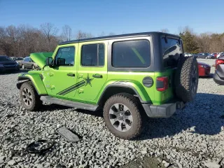 2019 Jeep Wrangler Unlimited Sahara with VIN 1C4HJXEN2KW510038, listed as a Copart auction lot 89243675 with 142,738 mi miles and Salvage title. Bid and sale history available at DreamBid. Image 2.