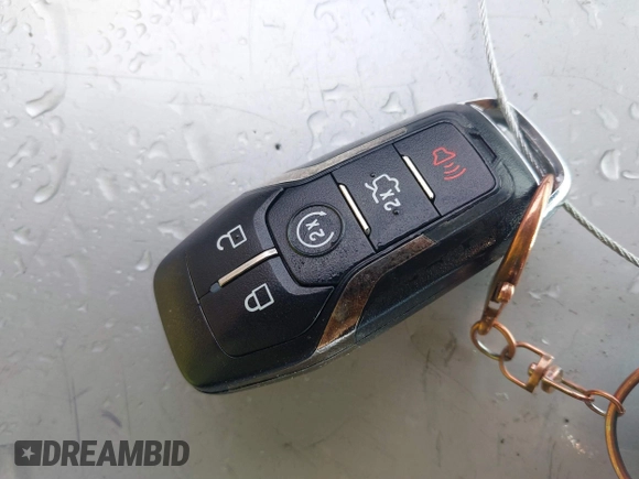 2015 Lincoln MKC z VIN 5LMCJ1A95FUJ20349, wystawiony jako IAAI lot #41695129 z przebiegiem 140 878 mil mil oraz . Historia ofert i sprzedaży dostępna na DreamBid. Obrazek 11.