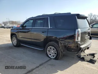 2017 GMC Yukon SLT with VIN 1GKS2BKC1HR217445, listed as a Copart auction lot 48499215 with 104,526 mi miles and Salvage Title. Bid and sale history available at carsss.com. Image 2.
