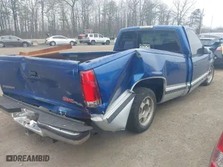 1997 GMC New Sierra 1500 SLE with VIN 1GTEC14W6VZ503469, listed as a IAAI auction lot 41798168 with 232,567 mi miles. Bid and sale history available at carsss.com. Image 4.