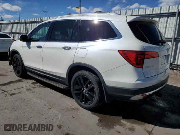 2017 Honda Pilot Touring with VIN 5FNYF6H91HB007611, listed as a Copart auction lot 47217175 with 107,349 mi miles and Salvage Title. Bid and sale history available at DreamBid. Image 2.