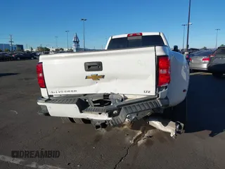 2018 Chevrolet Silverado 3500HD High Country with VIN 1GC4K1EY6JF207068, listed as a IAAI auction lot 41288394 with 110,158 mi miles and . Bid and sale history available at DreamBid. Image 11.