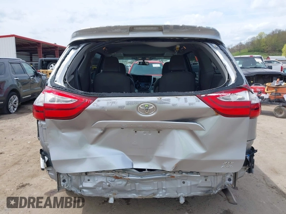 2017 Toyota Sienna XLE with VIN 5TDDZ3DC4HS164017, listed as a IAAI auction lot 41983055 with 90,702 mi miles and . Bid and sale history available at DreamBid. Image 6.