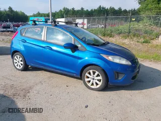 2011 Ford Fiesta SE z VIN 3FADP4EJ6BM141666, wystawiony jako IAAI lot #42506531 z przebiegiem 133 431 mil mil oraz . Historia ofert i sprzedaży dostępna na DreamBid. Obrazek 1.