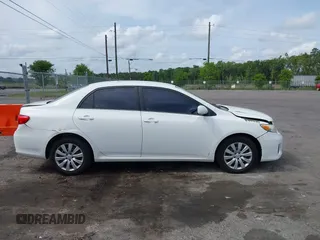 2012 Toyota Corolla L with VIN 5YFBU4EE5CP044613, listed as a IAAI auction lot 42113624 with 208,780 mi miles and . Bid and sale history available at carsss.com. Image 13.