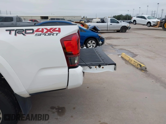 2019 Toyota Tacoma SR z VIN 3TMCZ5AN4KM220154, wystawiony jako IAAI lot #41602065 z przebiegiem 92 345 mil mil oraz . Historia ofert i sprzedaży dostępna na DreamBid. Obrazek 18.