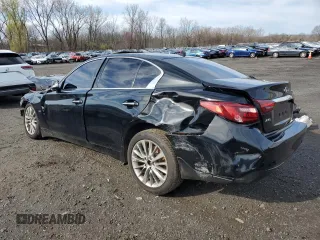 2019 Infiniti Q50 Luxe z VIN JN1EV7AR4KM592160, wystawiony jako Copart lot #52299965 z przebiegiem 99 645 mil mil oraz Czysty tytuł • Clean title. Historia ofert i sprzedaży dostępna na DreamBid. Obrazek 2.