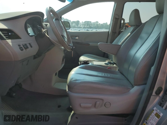 2013 Toyota Sienna XLE AAS with VIN 5TDYK3DC0DS357281, listed as a Copart auction lot 61640645 with 69,262 mi miles and Salvage title. Bid and sale history available at DreamBid. Image 7.
