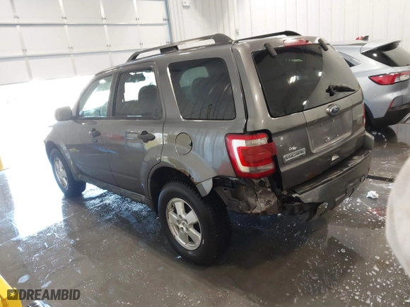 2010 Ford Escape XLT with VIN 1FMCU0D75AKA12803, listed as a IAAI auction lot 41339117 with 175,580 mi miles. Bid and sale history available at carsss.com. Image 3.