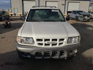 2002 Isuzu Rodeo S with VIN 4S2CK58W324314240, listed as a Copart auction lot 43694015 with 132,212 mi miles and Salvage title. Bid and sale history available at DreamBid. Image 5.