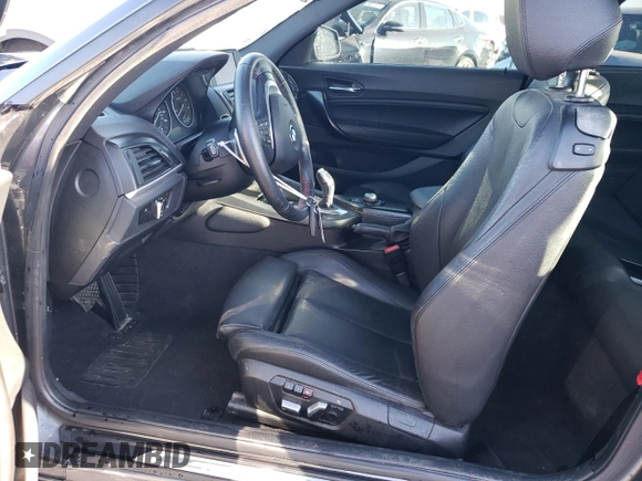 2016 BMW 2 Series 228i with VIN WBA1F9C55GV546771, listed as a Copart auction lot 38291464 with 116,803 mi miles. Bid and sale history available at carsss.com. Image 7.