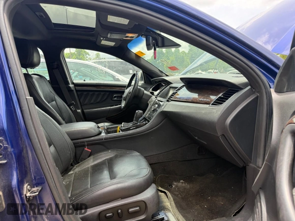 2014 Ford Taurus Limited with VIN 1FAHP2F84EG141388, listed as a Copart auction lot 61052645 with 112,876 mi miles and Clean title. Bid and sale history available at DreamBid. Image 5.