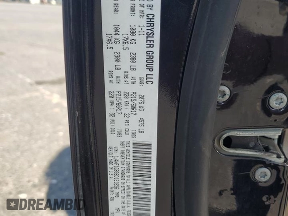 2011 Jeep Patriot Latitude z VIN 1J4NF1GB0BD131856, wystawiony jako Copart lot #56222005 z przebiegiem 172 231 mil mil oraz Szkoda całkowita • Salvage title. Historia ofert i sprzedaży dostępna na DreamBid. Obrazek 13.