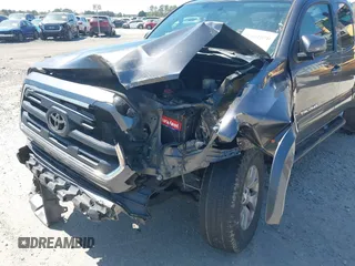 2016 Toyota Tacoma SR with VIN 5TFRX5GN6GX070766, listed as a IAAI auction lot 40461070 with 144,039 mi miles and . Bid and sale history available at DreamBid. Image 6.