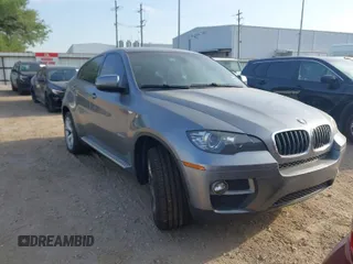 2014 BMW X6 xDrive35i with VIN 5UXFG2C58E0H11141, listed as a IAAI auction lot 42050279 with 191,119 mi miles. Bid and sale history available at carsss.com. Image 1.