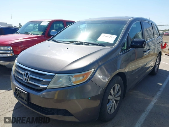 2012 Honda Odyssey EX-L with VIN 5FNRL5H65CB012428, listed as a IAAI auction lot 42164272 with 256,253 mi miles and . Bid and sale history available at carsss.com. Image 2.