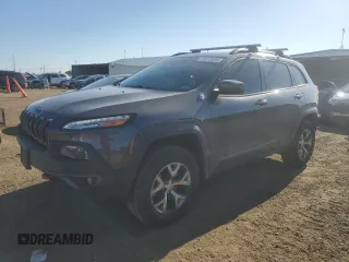 2015 Jeep Cherokee Trailhawk z VIN 1C4PJMBS9FW741352, wystawiony jako Copart lot #57813535 z przebiegiem 105 642 mil mil oraz Szkoda całkowita • Salvage title. Historia ofert i sprzedaży dostępna na DreamBid. Obrazek 1.