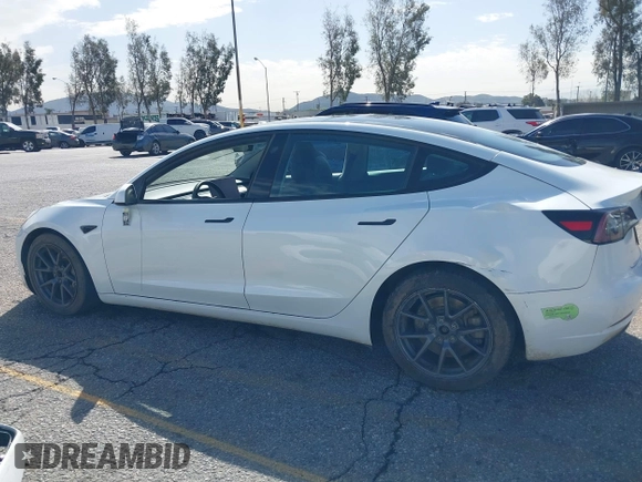 2023 Tesla Model 3 with VIN 5YJ3E1EA8PF398110, listed as a IAAI auction lot 41692006 with 112,699 mi miles and . Bid and sale history available at carsss.com. Image 14.