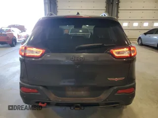2015 Jeep Cherokee Trailhawk with VIN 1C4PJMBS5FW615845, listed as a Copart auction lot 52824635 with 134,873 mi miles and Salvage Title. Bid and sale history available at carsss.com. Image 6.