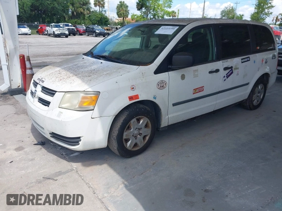 2008 Dodge Grand Caravan SE with VIN 1D8HN44H98B126418, listed as a IAAI auction lot 42223290 with 317,457 mi miles and . Bid and sale history available at DreamBid. Image 2.