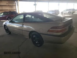 1989 Ford Probe z VIN 1ZVBT21C8K5178908, wystawiony jako Copart lot #87082684 z przebiegiem 84 344 mil mil oraz Tytuł czysty. Historia ofert i sprzedaży dostępna na DreamBid. Obrazek 2.